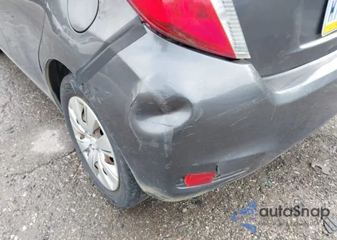 2013 Toyota Yaris Le z USA, uszkodzony, nr VIN JTDKTUD30DD546839